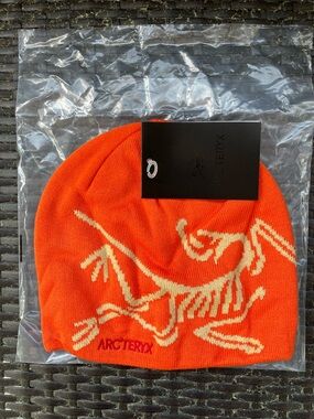 Arc'teryx Bright Orange Beanie with Cream Logo